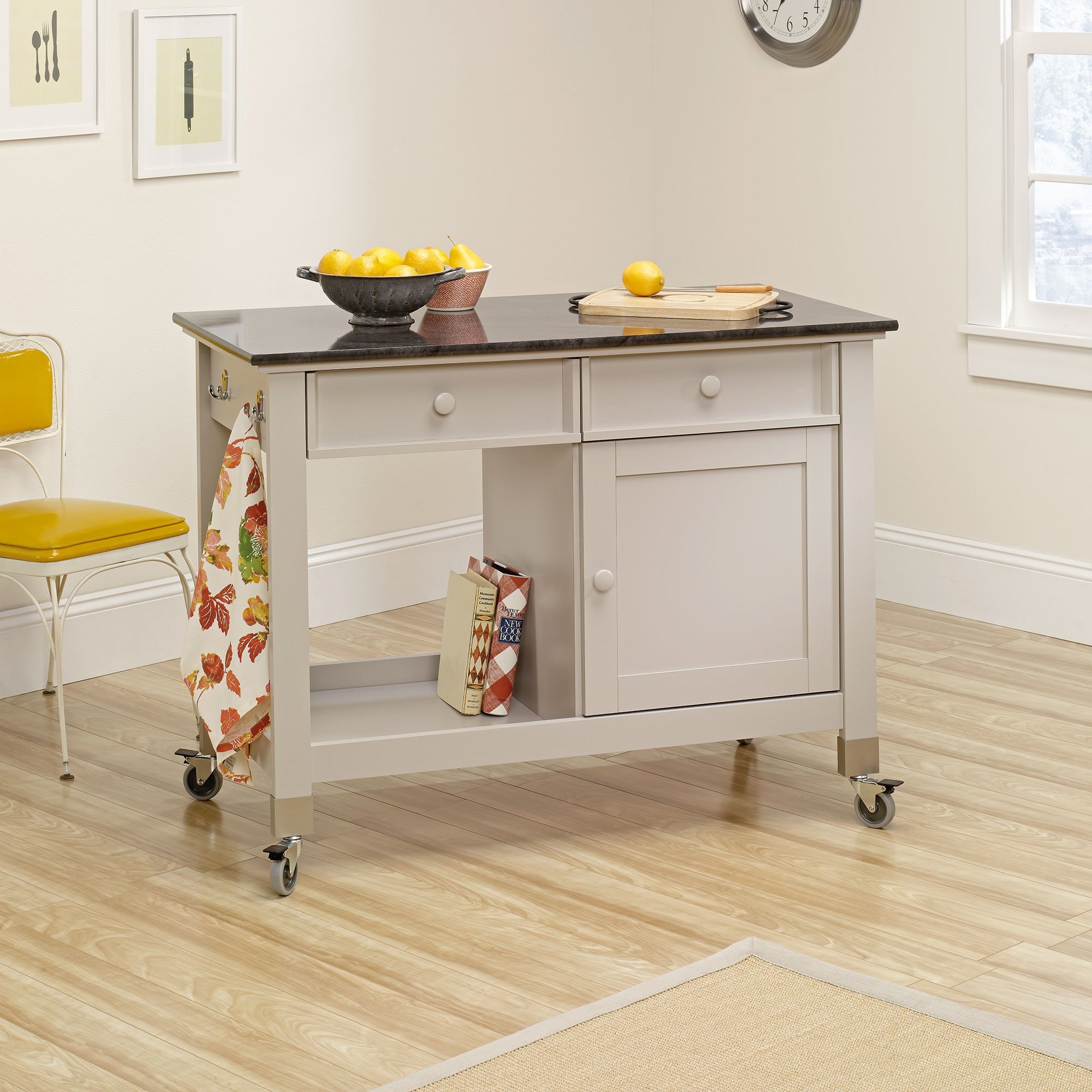 Taupe colored kitchen island on caster wheels
